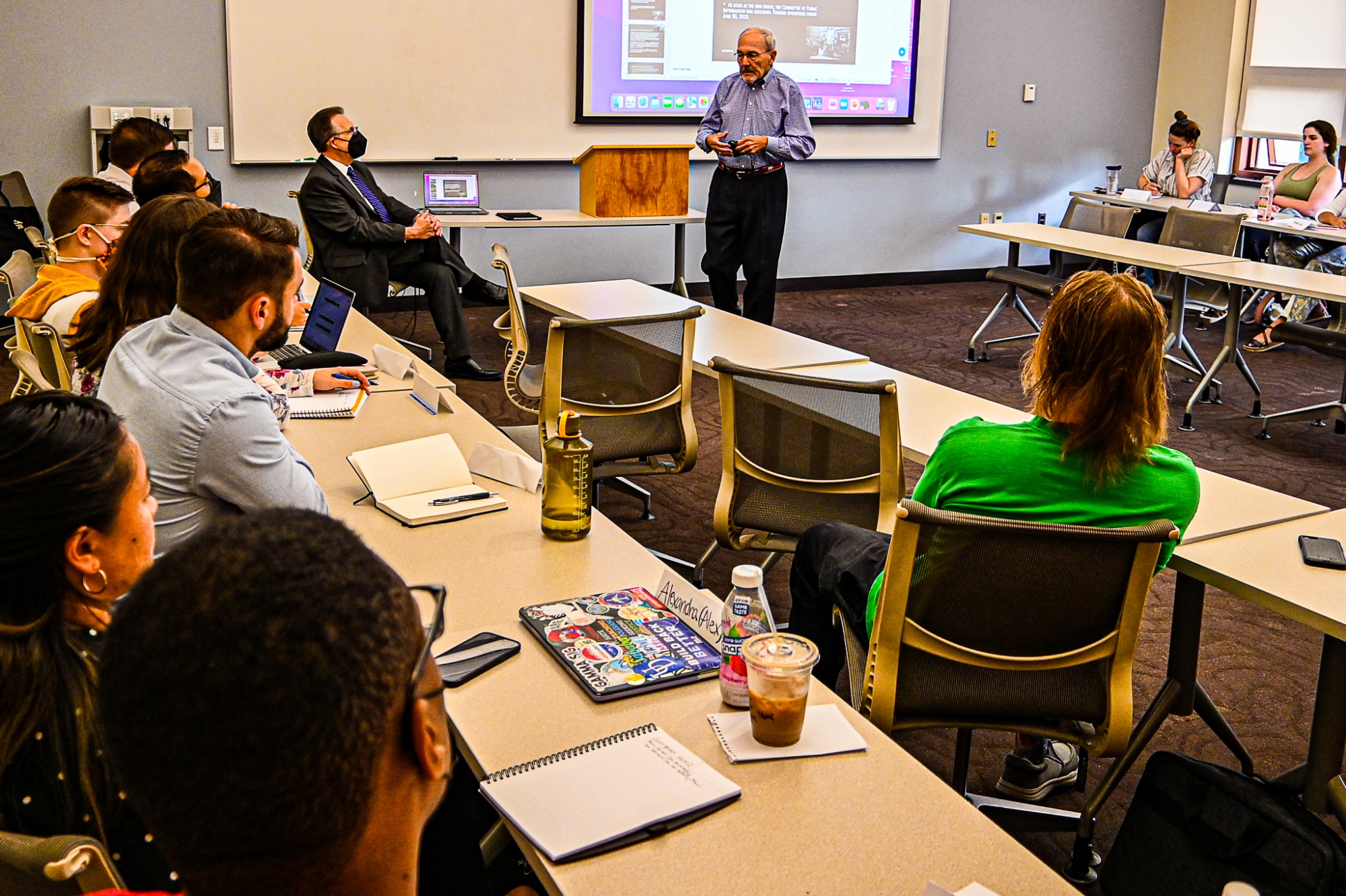 Ambassador Brian Carlson teaches university students